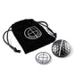 The One Rail Ball Markers by OnPointGolf.us include a black velvet drawstring pouch with the logo, a coin-shaped 3D marker with the OnPointGolf.us logo, and a black-and-white dimpled ball marker resembling a split golf ball.
