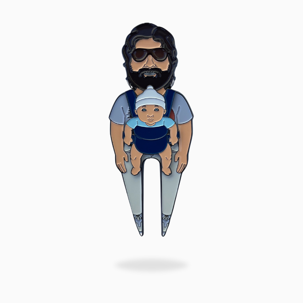 Add personality to your golf gear with Pin Creatures’ "Are You Hungover?" enamel pin—a cartoon-style bearded man in sunglasses, carrying a baby in a front carrier. Perfect as a playful accessory or fun ball marker on the course!.