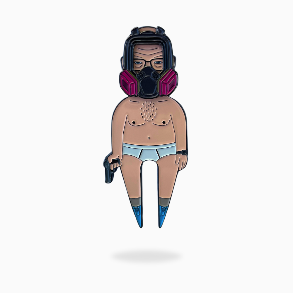 The Pin Creatures Walt Divot Tool features a cartoon-style man in a gas mask, white underwear, blue socks, and holding a gun, paired with a golf ball marker accent—all set against a plain white background.