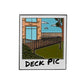 A drawing of a house with a deck, fence, grass, and tree appears Polaroid-style with "DECK PIC" on the border. The Deck Pic Ball Marker from Ballmarkers.com is perfect for sharing with playing partners.