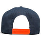 The back view of the Logie Joe's Golf Parrot Patrol Golf Hat in navy, showing perforations and an adjustable orange snapback with a built-in magnetic ball marker holder, isolated on a white background.
