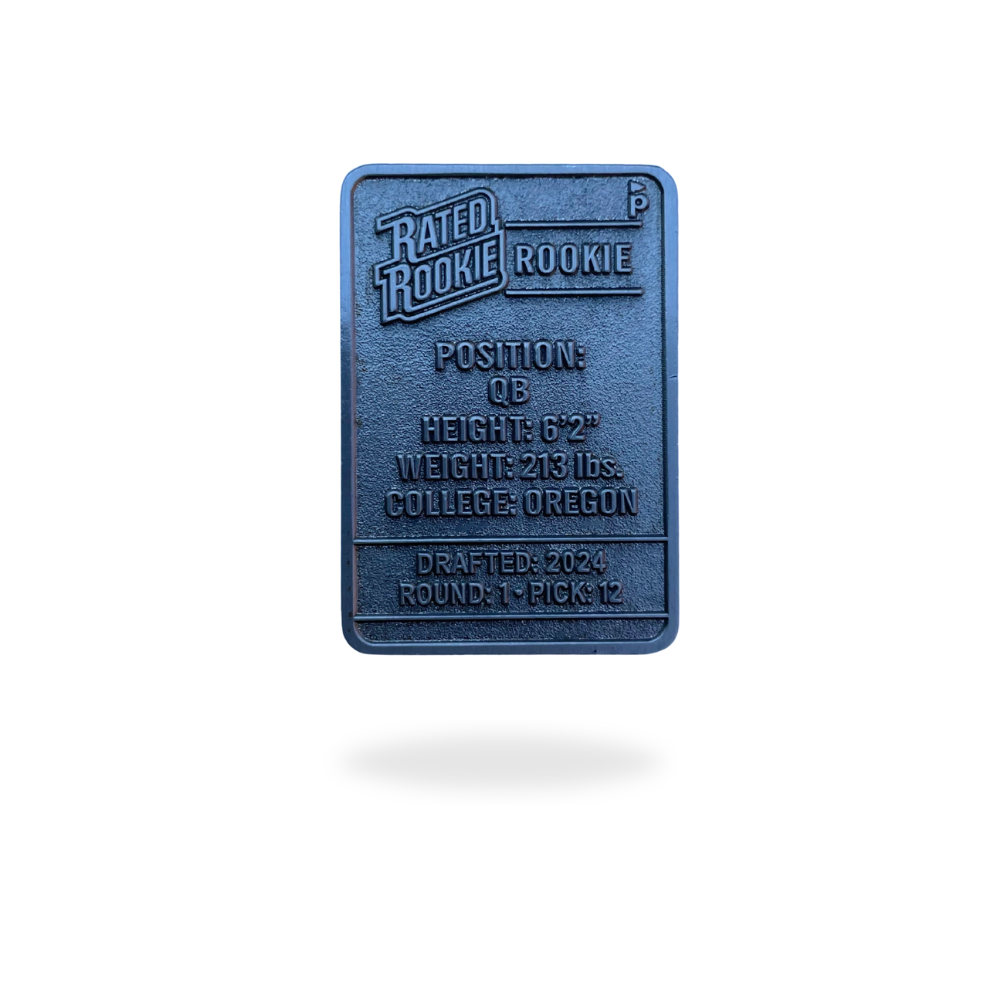 The Pin Creatures Denver Trading Card Ball Marker features RATED ROOKIE at the top and lists football stats: QB, 6'2", 213 lbs, Oregon, drafted 2024, round 1, pick 12. The metallic card floats on a white background.