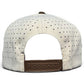 Back view of Logie Joe's Golf Longhorn Golf Hat in tan, featuring a bull skull design, ventilation holes, adjustable brown snapback closure, and a built-in magnetic ball marker holder with marker included.