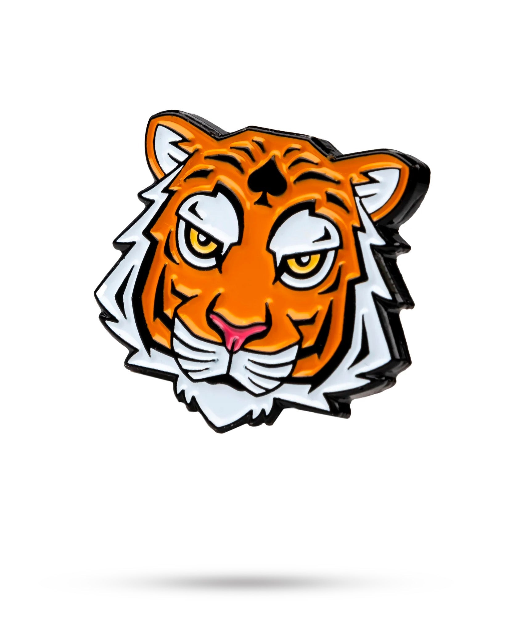 The Pins and Aces Tiger Ball Marker features a vibrant enamel pin design of a stylized tiger’s head with orange fur, white accents, and a spade symbol on its forehead, crafted on a durable cast steel base. Shown on a white background with a faint shadow.