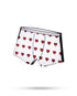 Heart Boxers Ball Marker by Pins and Aces floats against a plain white background, showcasing its playful red heart and black outline pattern with a subtle shadow beneath.