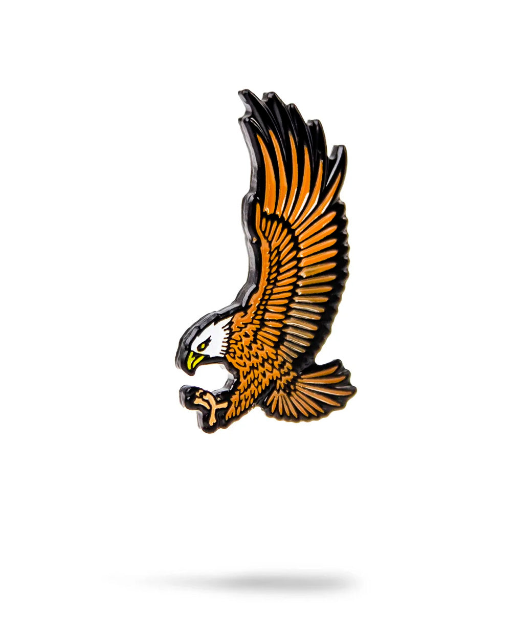 The Eagle Ball Marker by Pins and Aces features a flying eagle with outstretched wings, brown and orange feathers, white head, and yellow beak and claws on a white background—ideal for customizing your golf ball marker.