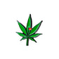 The Pot Leaf Ball Marker by Pins and Aces features a green cannabis leaf with a red flag on one leaflet, set against a white background with subtle shadow—ideal for magnetic ball markers or stainless steel accessories.