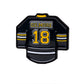 The Gilmore Jersey Ball Marker by Pins and Aces is a black enamel golf marker shaped like a hockey jersey, featuring yellow and white stripes, the name Gilmore, and bold yellow 18—perfect for sports fans.
