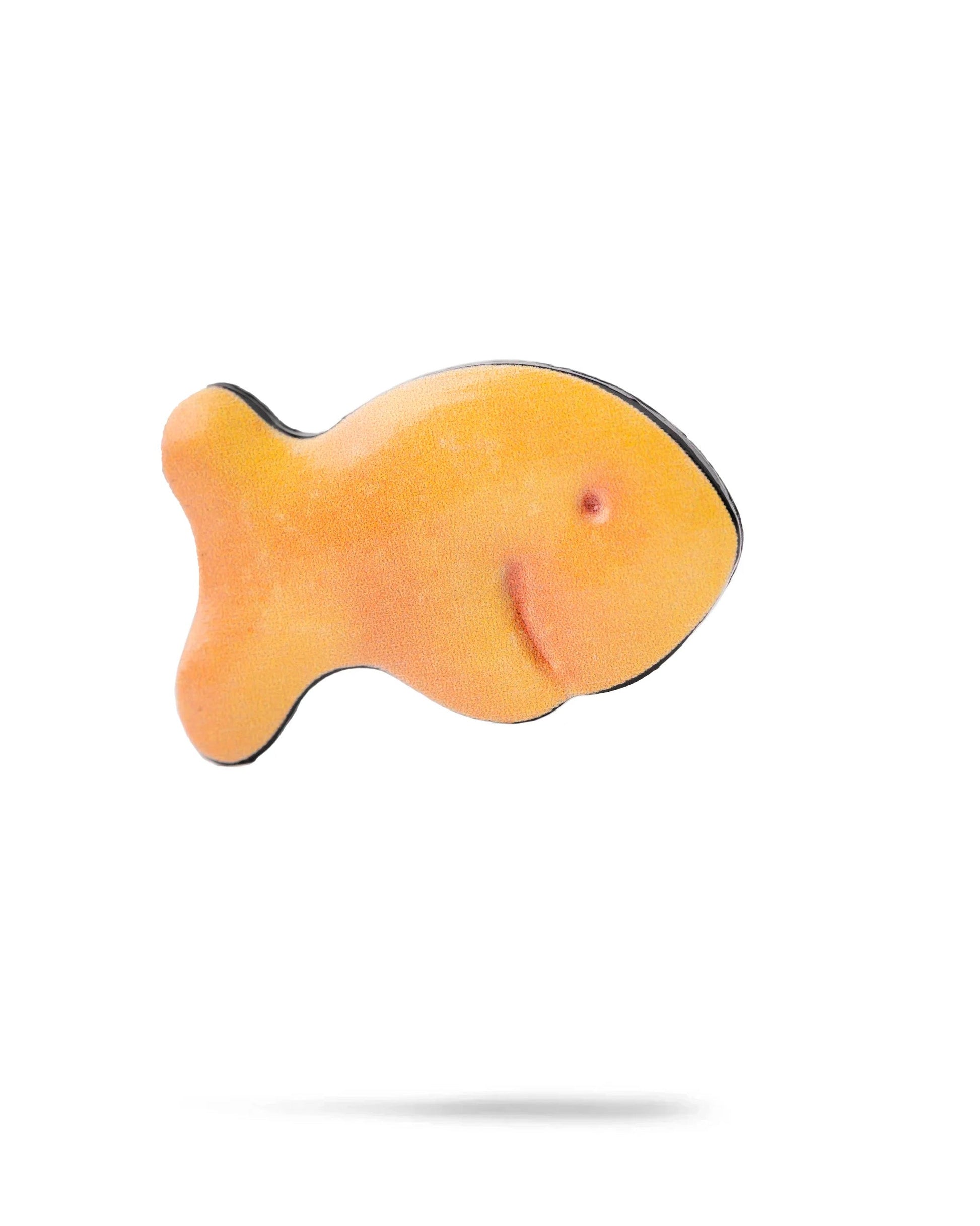 The Fish Cracker Ball Marker by Pins and Aces is shown as a single, orange, fish-shaped marker against a white background with a subtle shadow, highlighting its compact golf accessory design.
