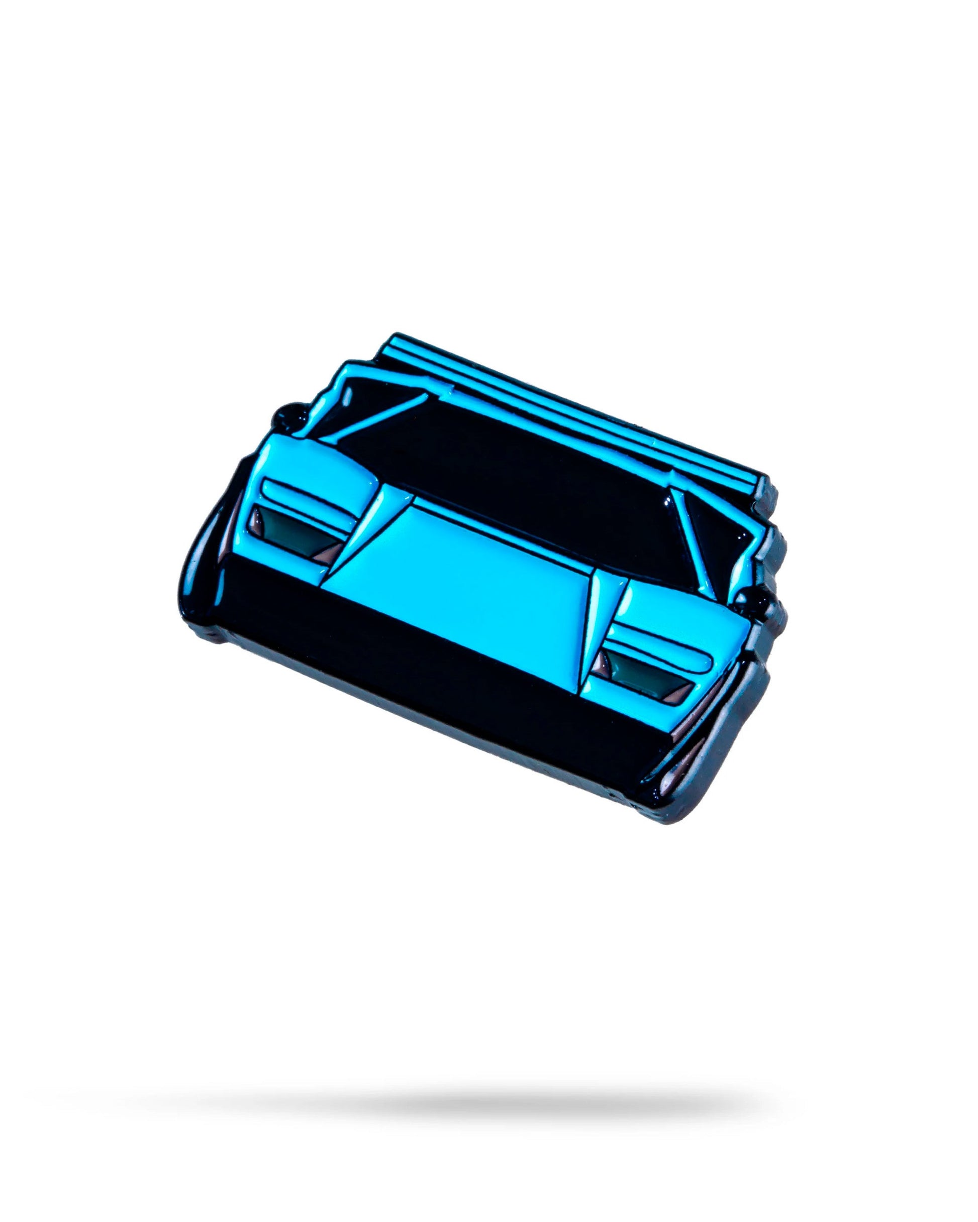 The Pins and Aces Blue Azul Ball Marker is a blue and black sports car-shaped enamel marker, shown from above on a white background with a faint shadow.