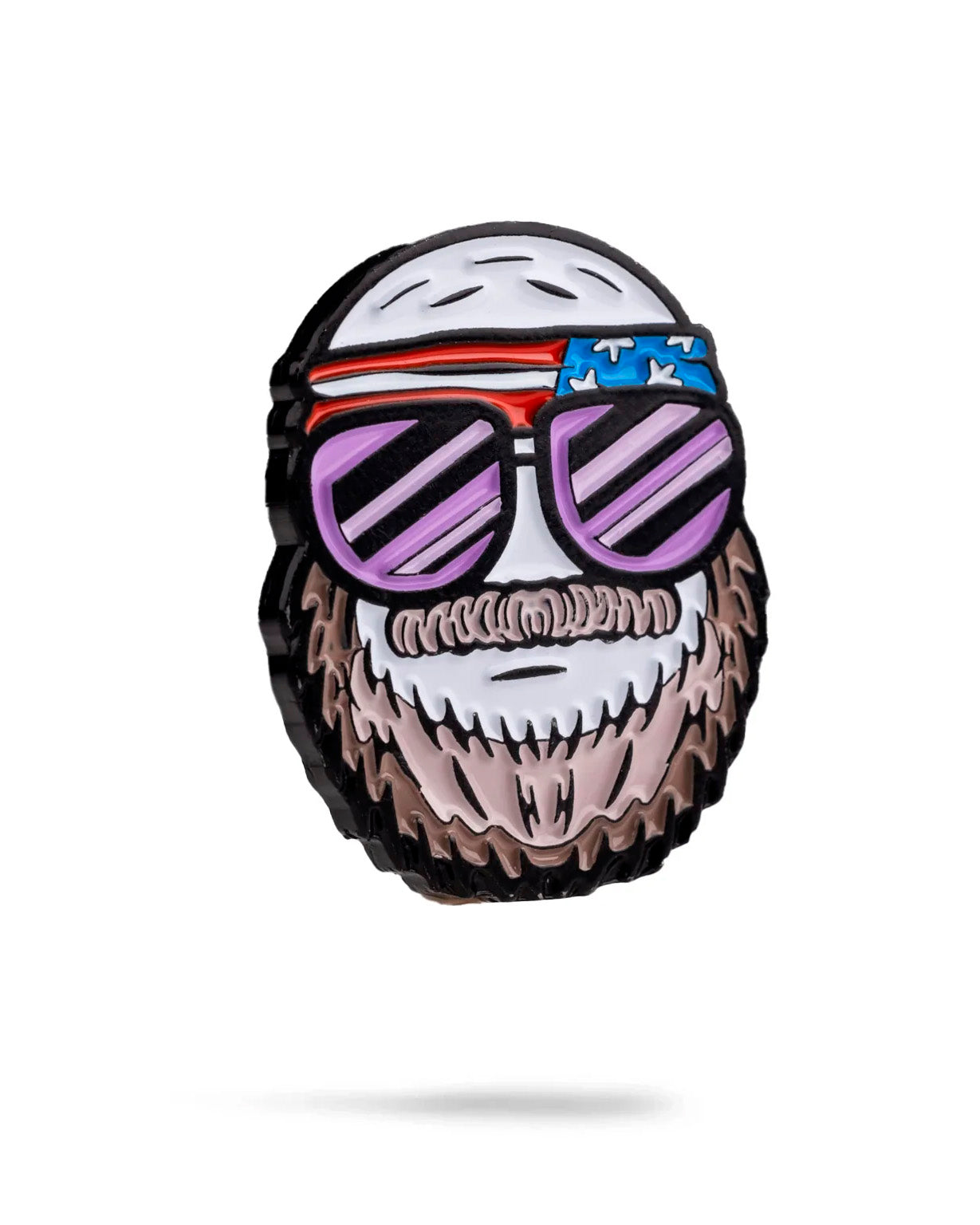 Gus the Degenerate Ball Marker by Pins and Aces features a cartoon face with a full beard, bald head, purple sunglasses, and an American flag bandana. Ideal for decorating any magnetic surface or stainless steel item. White background with subtle shadow.