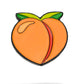 The Peach Ball Marker by Pins and Aces features a stylized peach with two green leaves, black outlining, and a curved highlight on the left side, set against a white background for a clean enamel look.