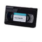 The VHS Ball Marker by Pins and Aces is shown—a black marker with a handwritten "Sing & Act 2021" label on a white background, casting a faint shadow. Its classic, simple design is reminiscent of enamel steel markers.