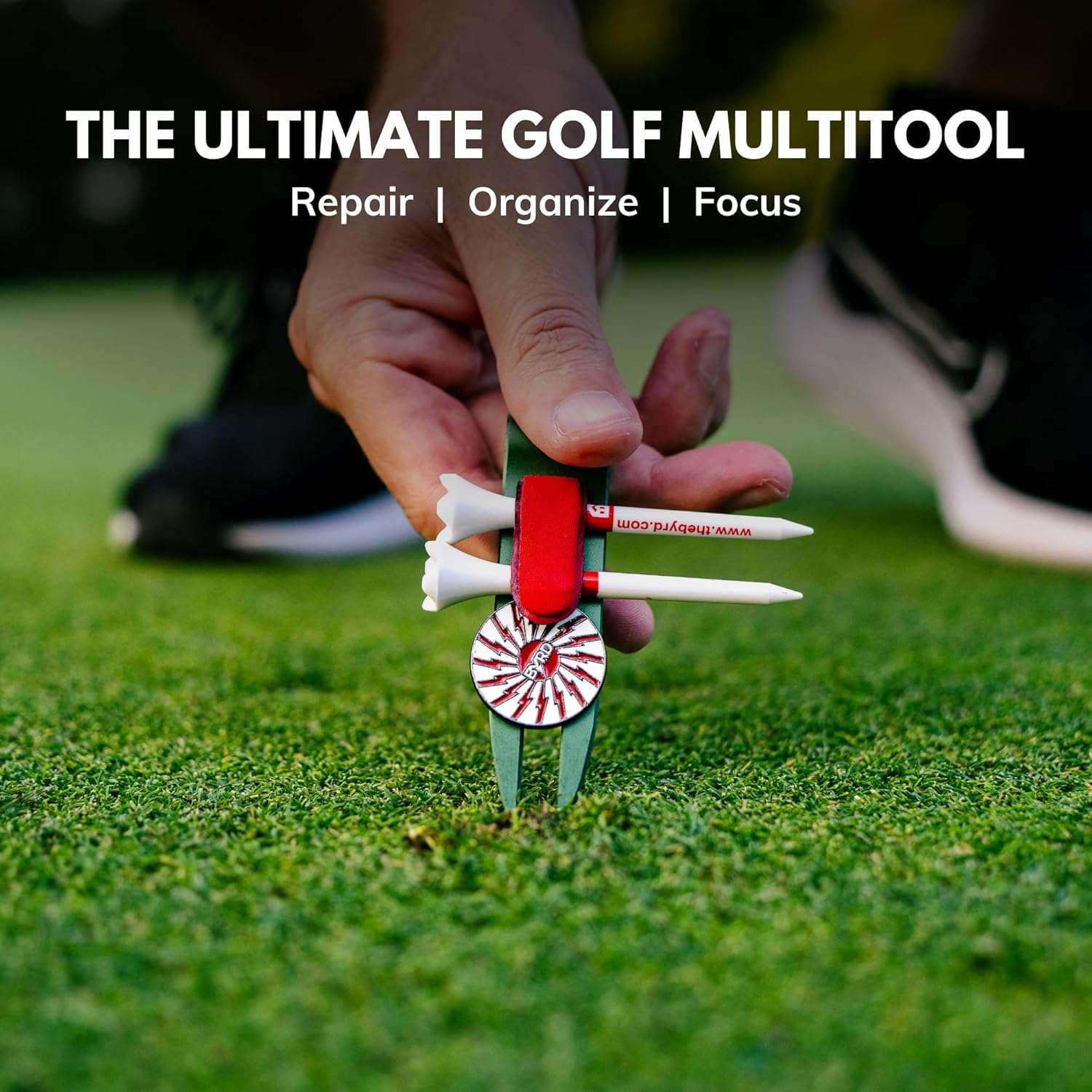 A hand uses THE BYRD GOLF DIVOT CLYP by The Byrd, LLC to repair turf and organize golf gear. Text above: Organize Your Golf Gear. Hot item—repair, organize, focus. Low stock—get THE BYRD GOLF DIVOT CLYP now!.