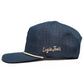The Parrot Patrol Golf Hat by Logie Joe’s Golf is an adjustable navy snapback featuring small perforations, white piping, "Logie Joe’s" embroidered in white script, and a built-in magnetic ball marker holder with marker included.