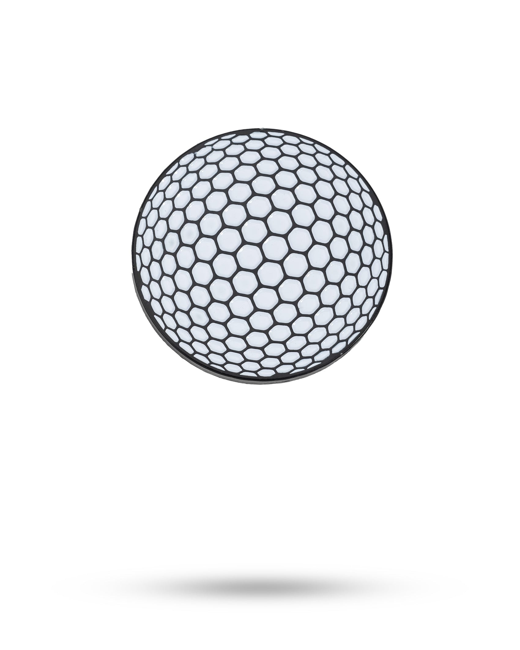 A white Golf Ball Ball Marker by Pins and Aces, featuring a black honeycomb-like hexagonal pattern, floats above a white background with a soft shadow, evoking the look of an enamel paint finish.