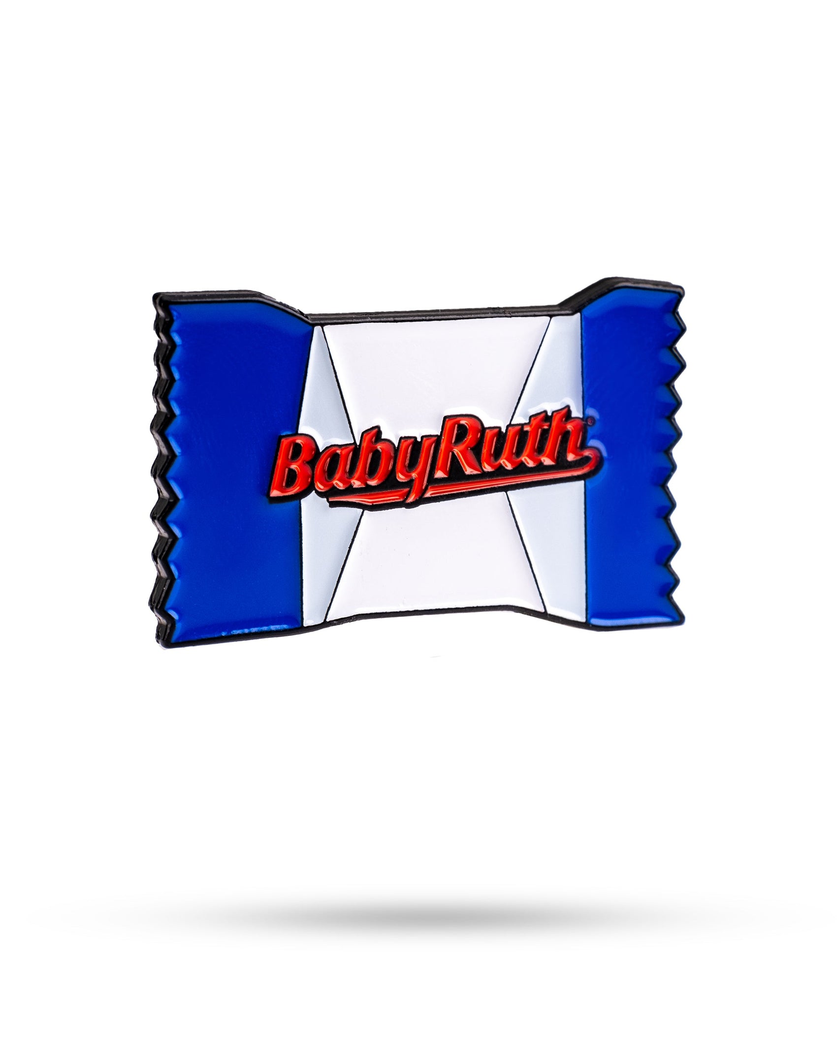 The Baby Ruth® Ball Marker by Pins and Aces is a limited edition pin shaped like a candy bar wrapper, with blue sides, a white center, and the red Baby Ruth logo—perfect for collectors and golf enthusiasts.