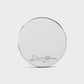 A round, sterling silver golf ball marker from Doubloon, The Omen Classic Antique, Diamond & Silver Edition, features "Dashbon" engraved in cursive near the bottom edge on a light gray background.