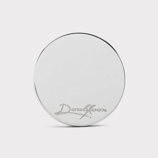A round, reflective sterling silver golf ball marker from Doubloon, "The Silver Omen Antique, Color Edition," engraved with script near the bottom, displayed on a plain light gray background.