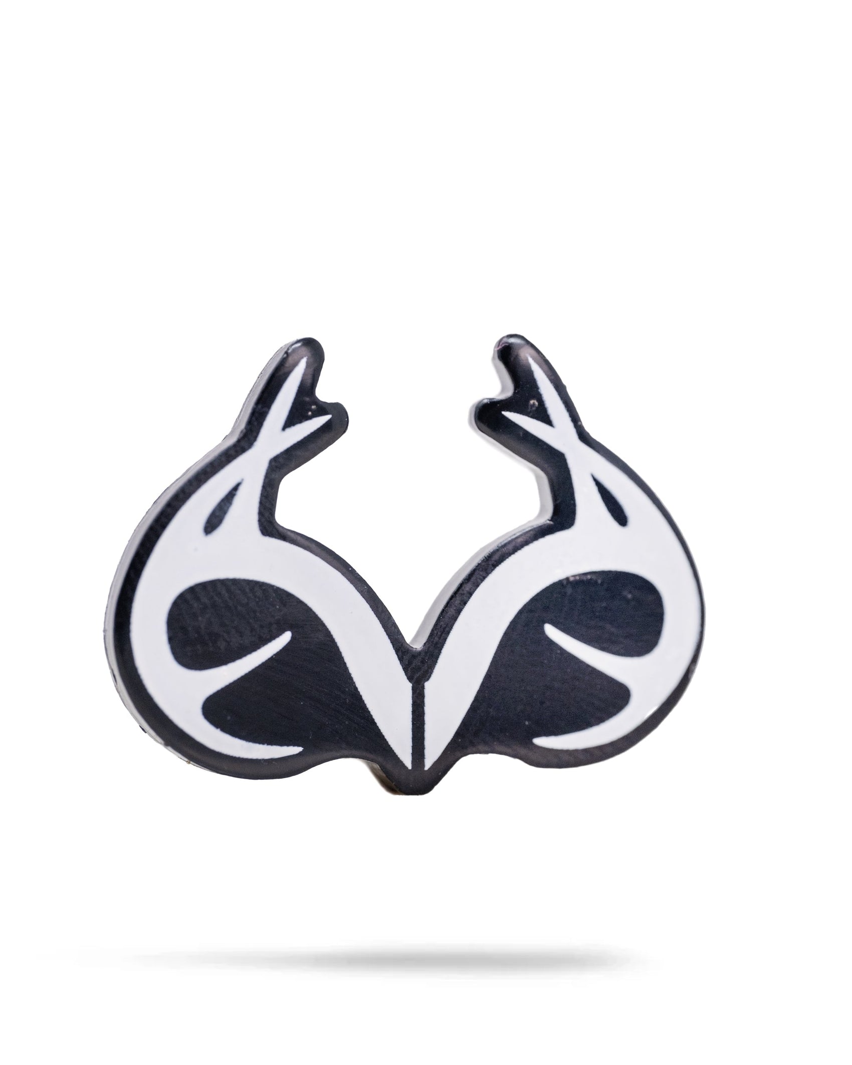 The Real Tree Antlers Ball Marker by Pins and Aces features antlers forming a symmetrical, heart-like design in black and white on a white background.