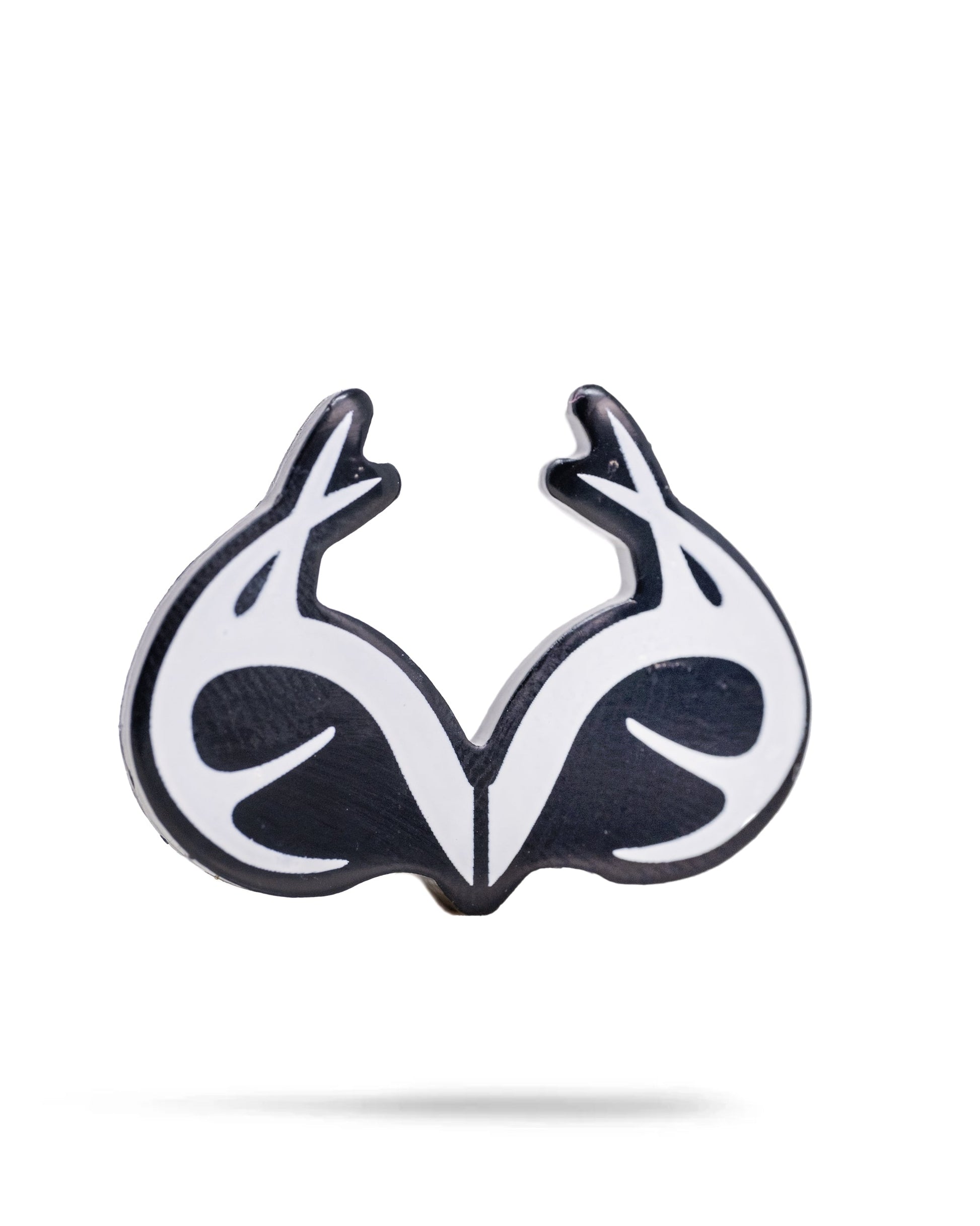 The Real Tree Antlers Ball Marker by Pins and Aces features antlers forming a symmetrical, heart-like design in black and white on a white background.