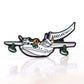 The Margaritaville Hemisphere Dancer Ball Marker by Pins and Aces features a cartoon seaplane with green wheels and a parrot pilot towing a white "MARGARITAVILLE" banner on a plain white background.