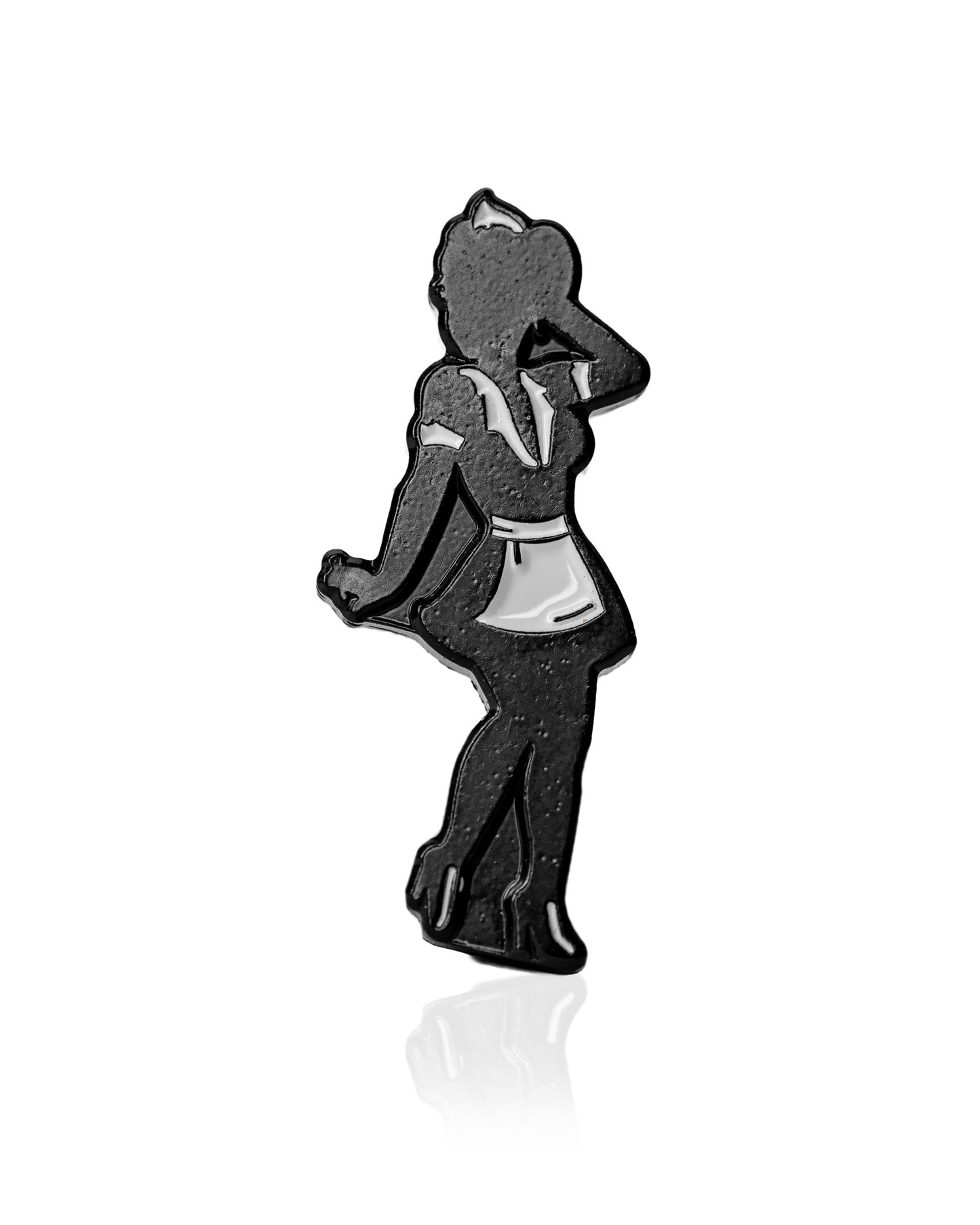 The Pins and Aces Blazy Susan Silhouette Ball Marker features a black enamel maid silhouette design with a white apron and headpiece, plus a magnetic hat clip for a stylish, premium golf accessory.