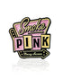 The Blazy Susan Smoke Pink Ball Marker by Pins and Aces features retro pink and yellow enamel text, "Smoke Pink," with "Blazy Susan" in cursive, and a stainless steel magnetic hat clip—ideal as a golf ball marker or accessory.