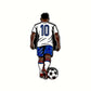 The Iconic #10 Ball Marker by Ballmarkers.com features a soccer-inspired player from behind in a white #10 jersey, blue shorts, red-and-white socks, and red shoes, standing with one foot on a soccer ball.