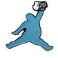 The ChunkMan Ball Marker by Grunk Dolfer features a blue silhouette of a person jumping with a beer mug, mimicking the iconic jumpman logo—an ideal playful golf gift or fun design for your ball marker.