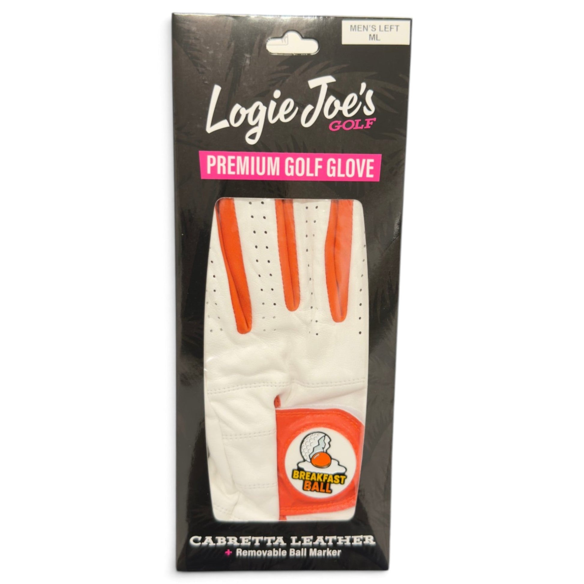 A packaged Logie Joe’s Golf Breakfast Ball Cabretta Leather Golf Glove, men’s left medium size, in white with orange accents and a Breakfast Ball logo on the wrist. The packaging showcases its luxurious cabretta leather construction and includes a convenient removable magnetic ball marker.