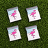 The Snowcane Baggie Ball Marker Bundle by Ballmarkers.com features four flamingo-themed pins, each shaped like a plastic bag with a blue, white, and red striped seal, arranged on green artificial grass.