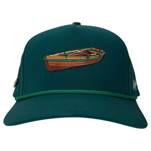 The Logie Joe's Golf Driftwood Golf Hat in Wood Boat Teal is an adjustable snapback cap featuring a wooden rowboat illustration, a matching green brim with decorative rope, and a built-in magnetic ball marker holder with marker included.