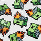Sure! Here’s a revised version incorporating your product data: The Guerrilla Golf "Dumpster Fire" design features multiple cartoon green dumpsters with expressive faces, each wreathed in vivid orange flames, forming a repeating pattern on a crisp white background. This playful and chaotic motif captures the classic dumpster fire spirit, with vibrant colors rendered in an enamel-like gloss for a polished, eye-catching finish.