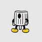Introducing the Fat Cap Ball Marker by Guerrilla Golf: a cartoon-style character with a trash can body, black arms and legs, white gloves, and oversized yellow shoes, set against a plain gray backdrop—an energetic tribute to graffiti culture inspired by classic NY fat style.