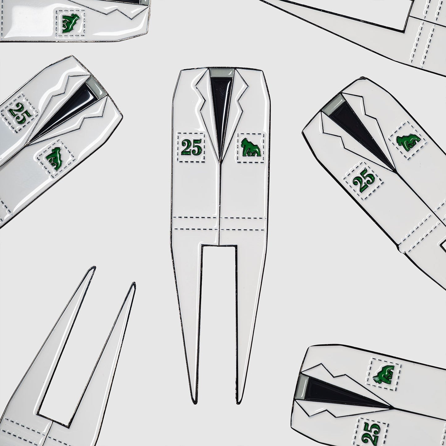 Repeating pattern of Guerrilla Golf Caddy divot tools shaped like white suit jackets, each featuring green Masters logos and “25” stamps, arranged on a light background—perfect as a unique golf accessory or memorable gift.