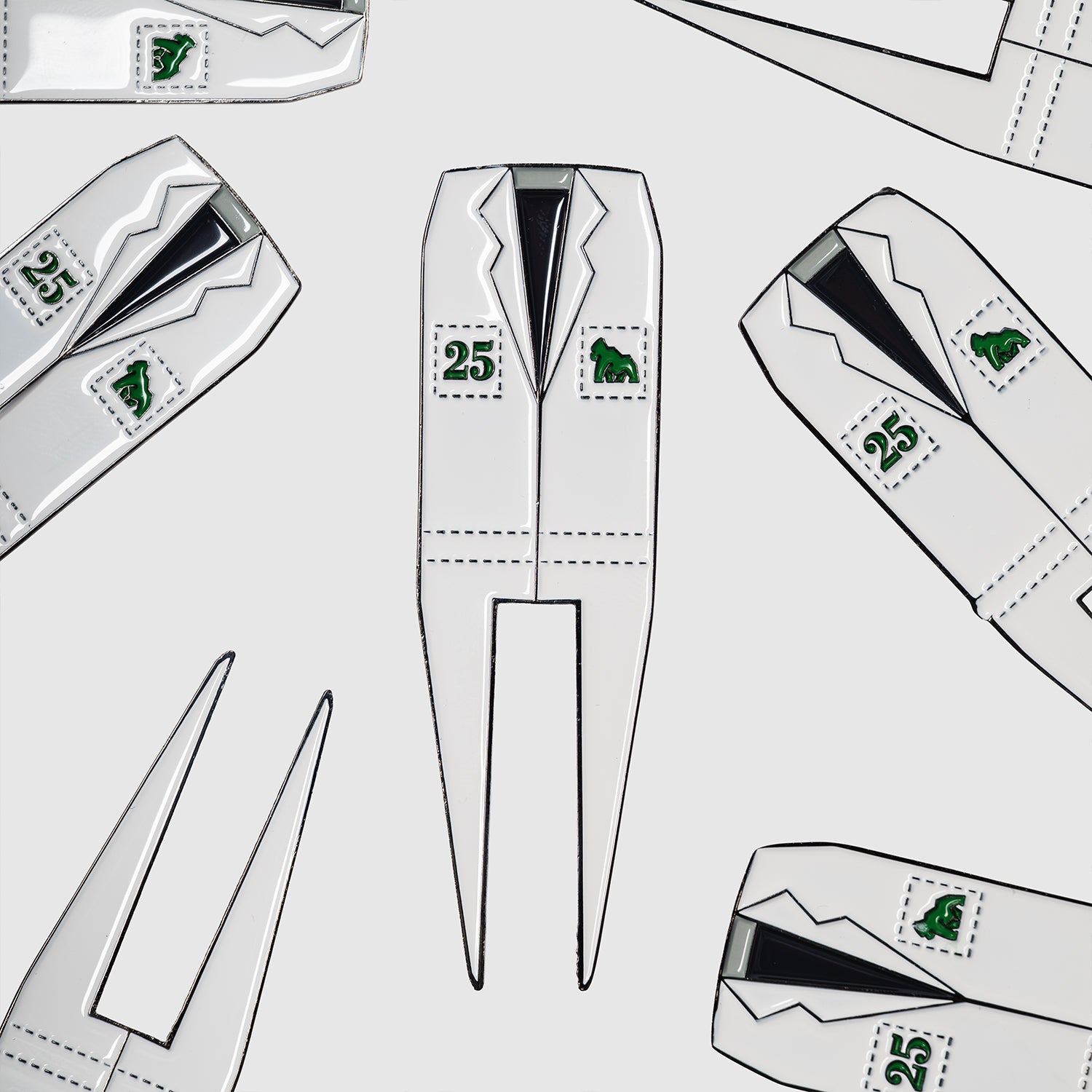 Repeating pattern of Guerrilla Golf Caddy divot tools shaped like white suit jackets, each featuring green Masters logos and “25” stamps, arranged on a light background—perfect as a unique golf accessory or memorable gift.