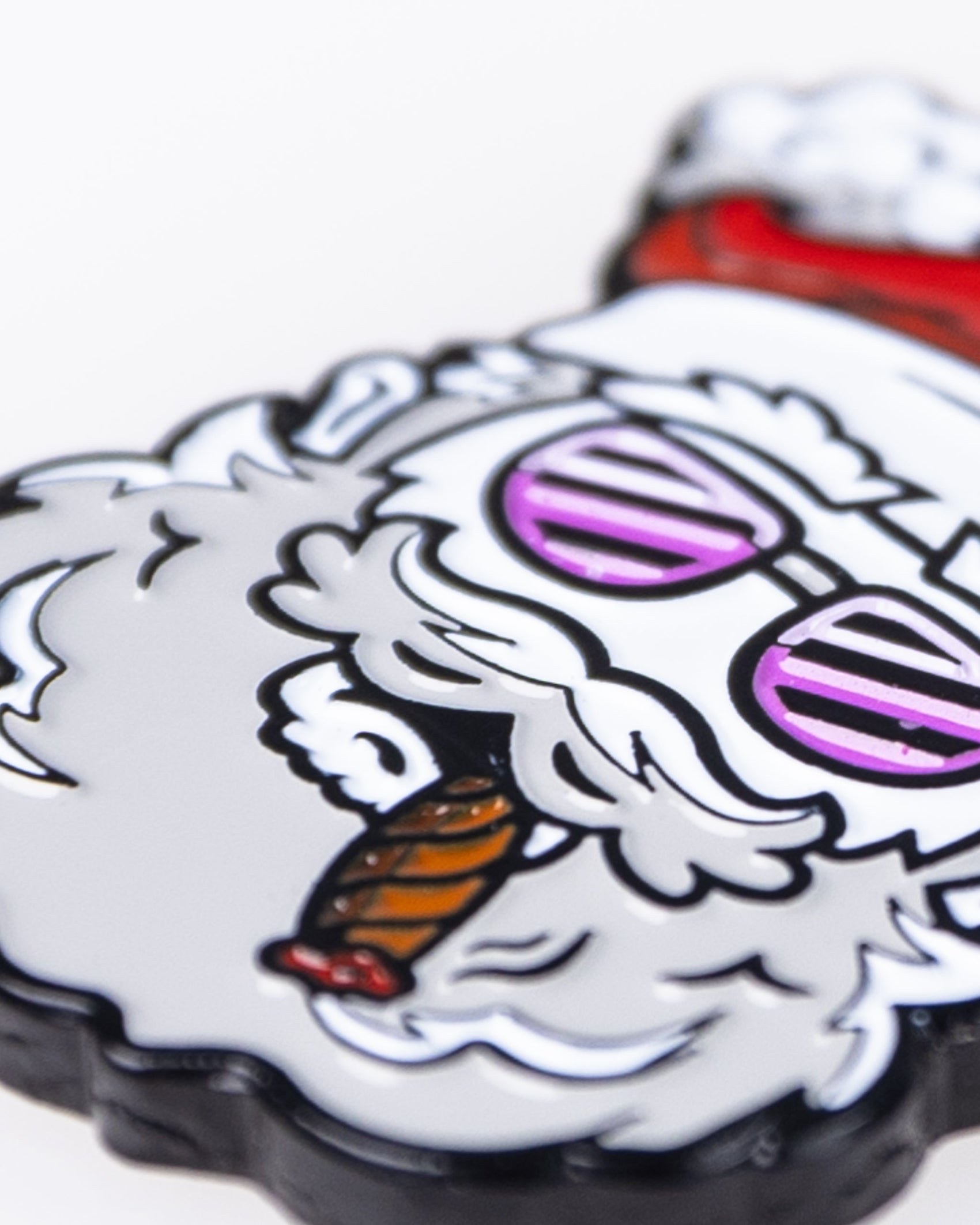 The Pins and Aces "Santa the Degenerate Ball Marker" features a bold close-up of Santa with purple shades, a red hat, and a cigar—perfect as a magnetic golf or fun Santa ball marker.