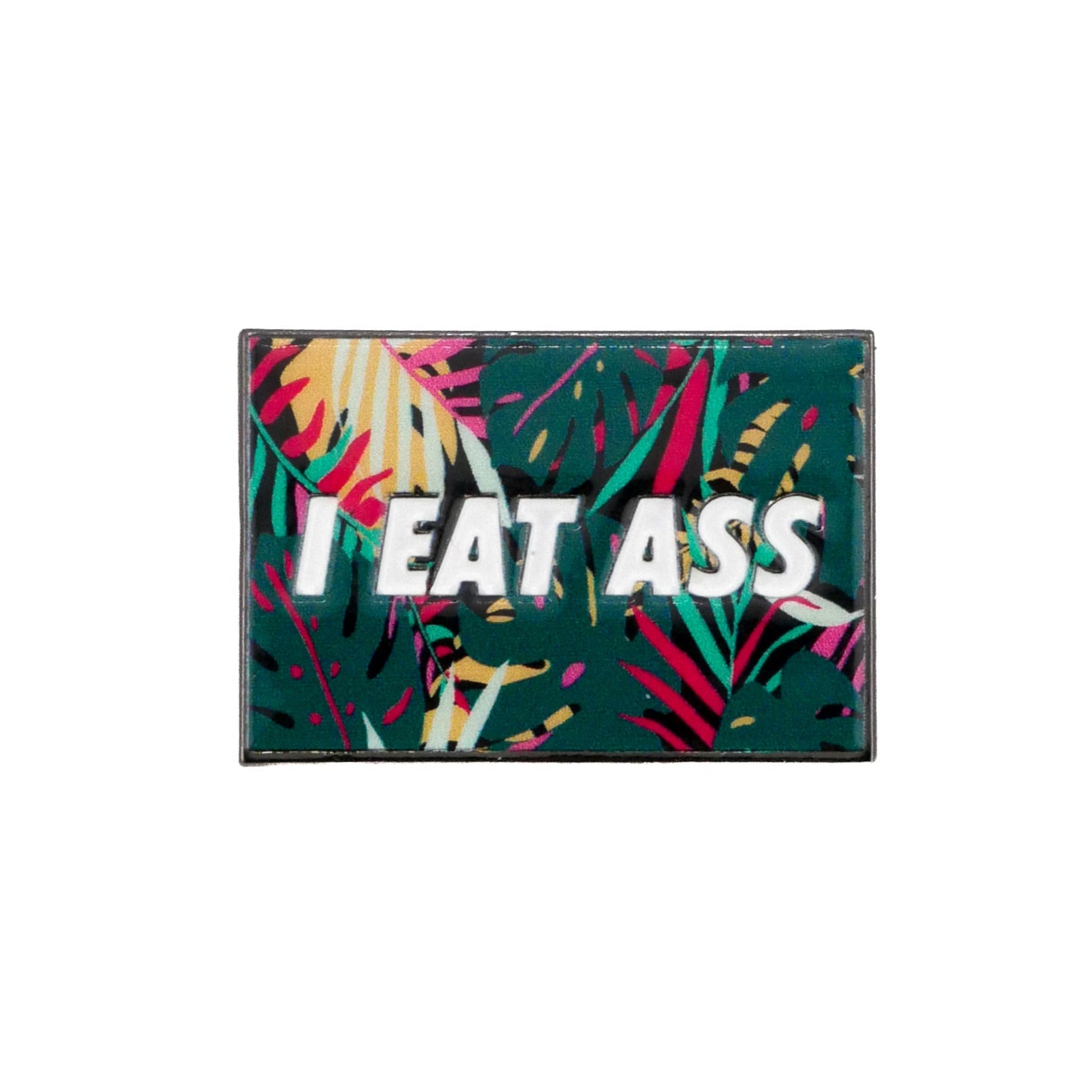 The Logie Joe's Golf I Eat *ss Tropical rectangular pin golf ball marker features a vibrant tropical leaf design and bold white text—an amusing golf accessory guaranteed to spark laughs on the course.