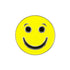 The Evergolf Smiley Face - Happy/Sad Ball Marker features a bright yellow face with black eyes, eyebrows, and a big smile on quality metal—an ideal addition to your golf accessories collection.