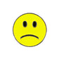The Evergolf Smiley Face - Happy/Sad metal ball marker features a yellow circular face with black oval eyes and a downturned mouth, adding personality and style to your golf accessories.