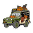 Illustration of the FORE x 4 Ball Marker by Ballmarkers.com—depicting a green and beige exploration vehicle with expedition golf gear and luggage on the roof, viewed from the front left side.