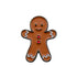 The Gingerbread Man Ball Marker by Ballmarkers.com features a smiling, icing-decorated design with red buttons—perfect for adding festive Christmas charm to your game.