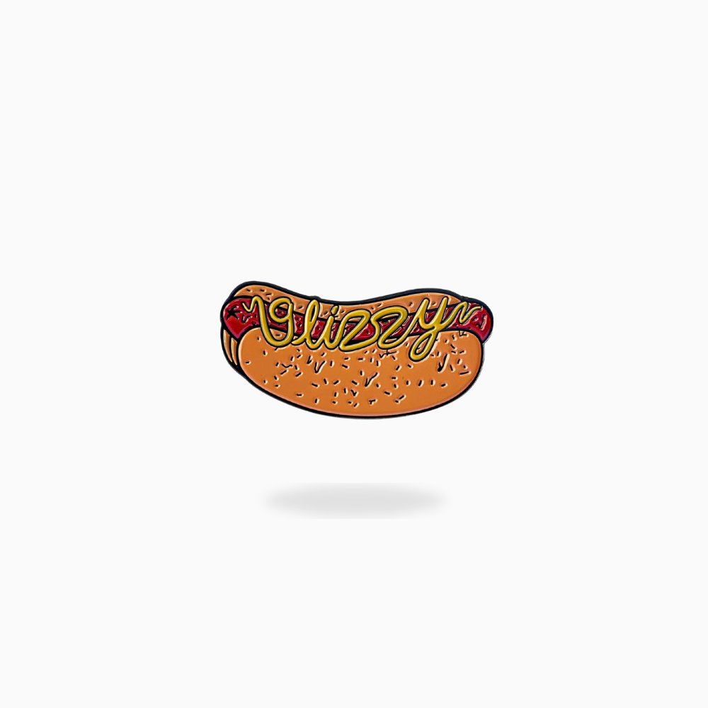 The Glizzy Ball Marker by Pin Creatures features a hot dog with ketchup, mustard, and “Glizzy” in yellow script—an eye-catching, hand-crafted golf ball marker shown on a white background with soft shadow.