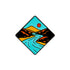 The Grand Canyon Ball Marker by Ballmarkers.com features a diamond-shaped design with a blue river winding through orange hills beneath a red sun and blue sky, inspired by Southwestern golf accessories.