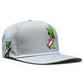The Logie Joe's Golf Alien Caddy Golf Hat is a light gray adjustable snapback with ventilation holes, an embroidered green alien holding a pink golf bag, and a built-in magnetic ball marker holder—marker included.