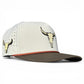 The Logie Joe's Golf Longhorn Golf Hat is a light gray and brown snapback cap with an adjustable tan bull skull design, ventilation holes, curved brim, and a built-in magnetic ball marker holder with marker included.