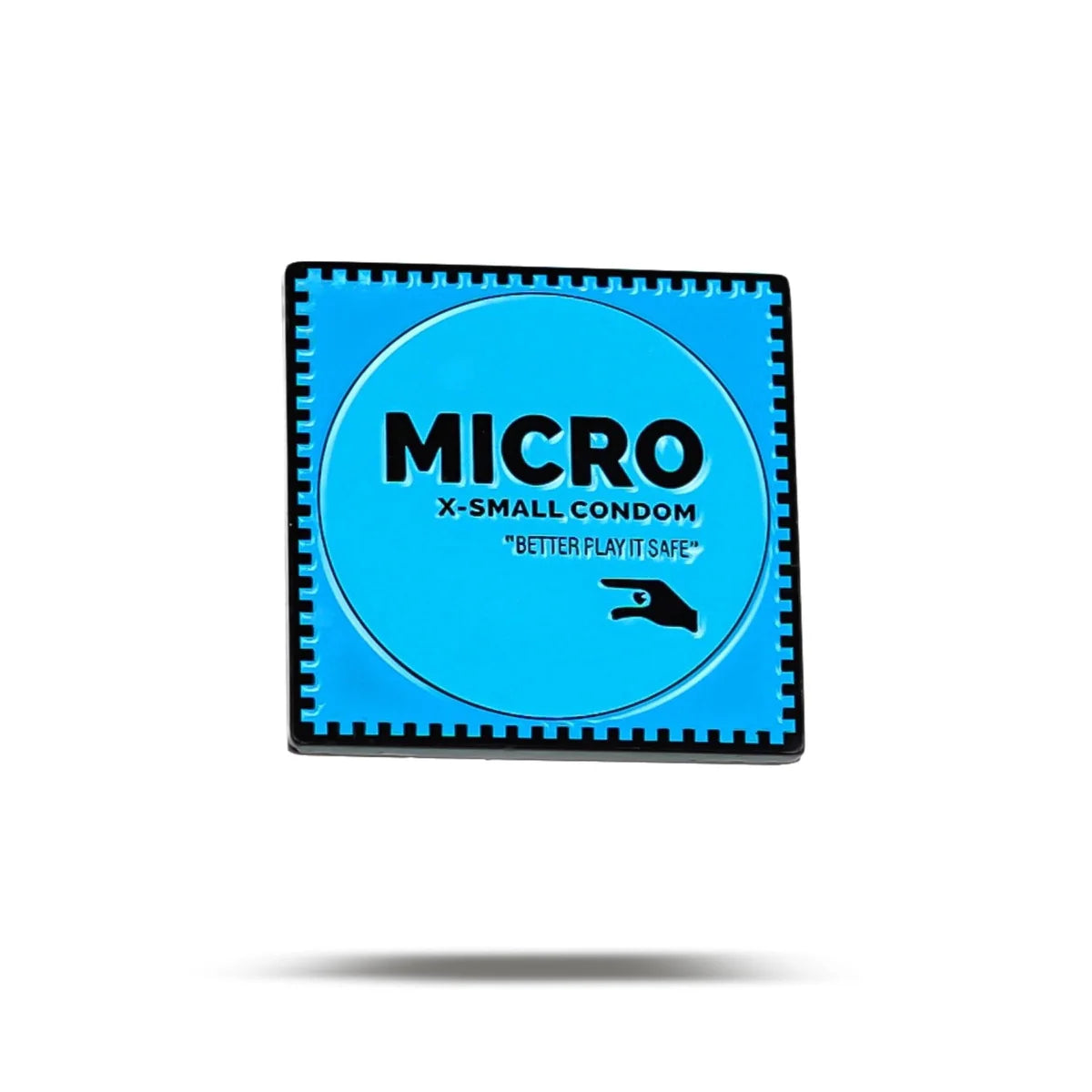 A blue square condom wrapper labeled “Micro” by Bogey Bros with the slogan “Better Play It Safe” and a hand graphic floats above a soft shadow—resembling a stylish golf ball marker or playful golf accessory on white.