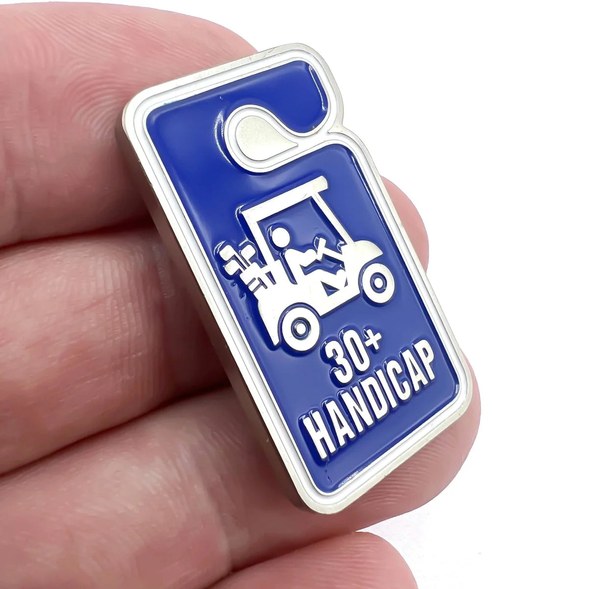 The Bogey Bros "30+ Handicap" pin, in blue and silver, features a golf cart decal—a humorous accessory highlighting your golf skill level.
