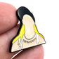 A hand holds the Bogey Bros "Scotty P" enamel pin, featuring a faceless figure with long yellow hair and a tank top that says NO RAGRETS—a funny novelty gift.